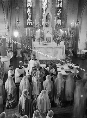 DR MORRISROE RECEIVING SODALISTS IN CONVENT CHAPEL